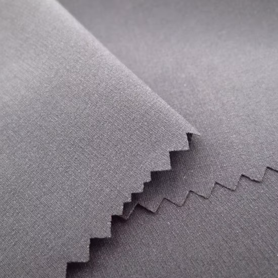 Tissu de vêtement jacquard imperméable en polyester/nylon/spandex extensible extérieur tissé recyclé pour uniforme de veste de manteau